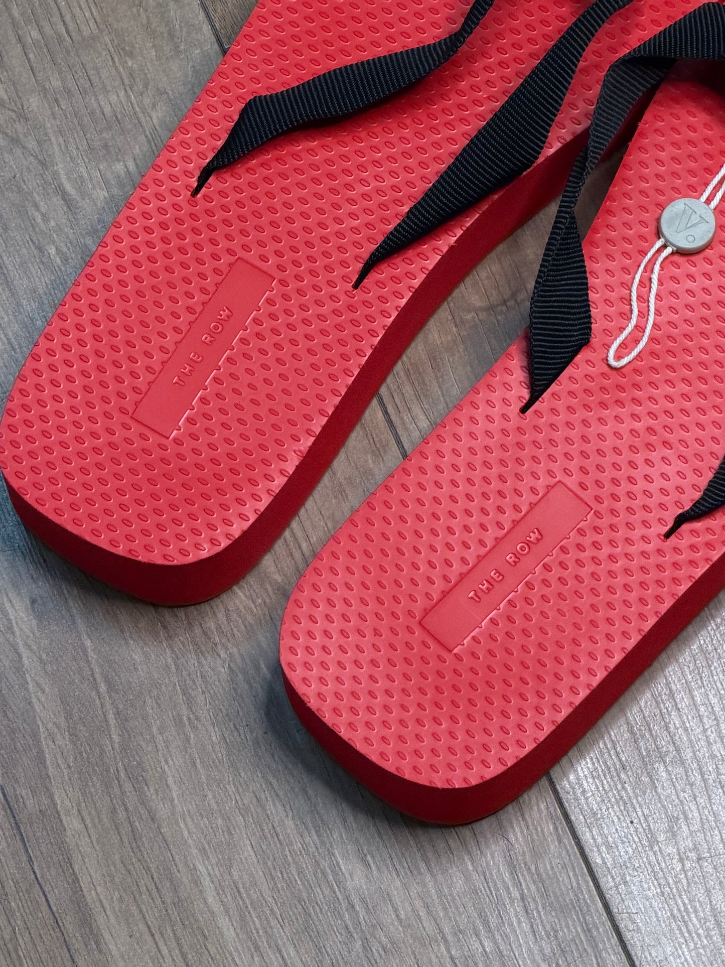 THOE ROW flip flops