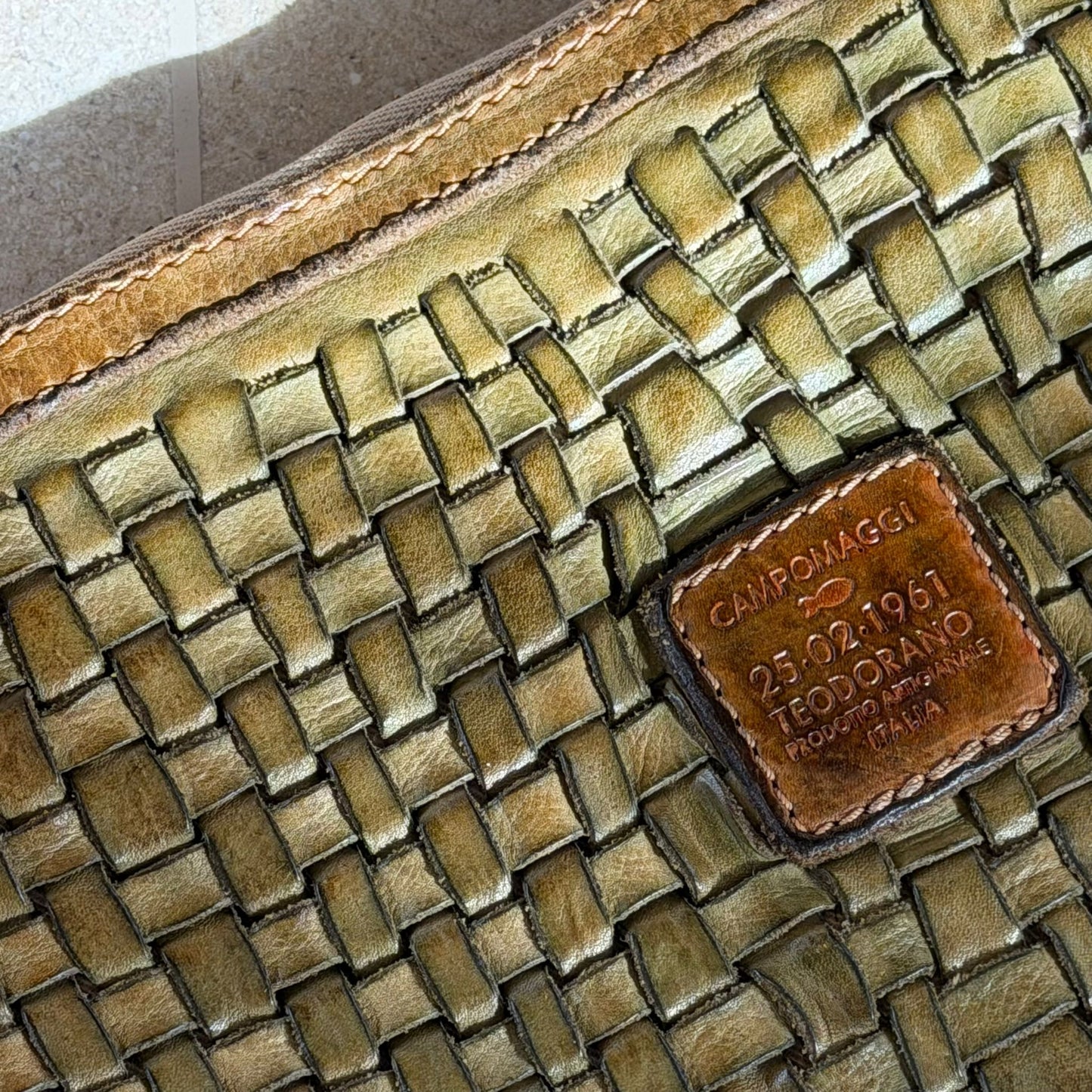 תיק עור קלוע של Campomaggi