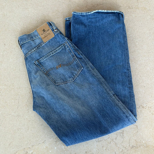 ג׳ינס תכלת קרעים של Denimist